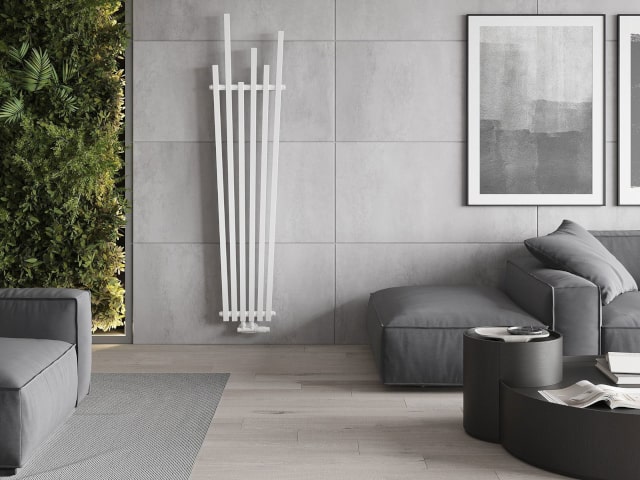Radiateur décoratif blanc dans la pièce