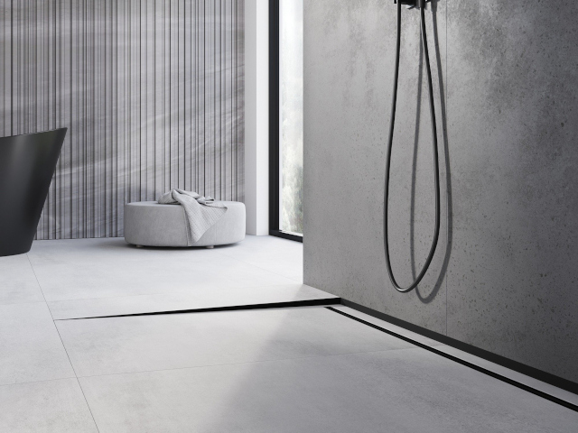 Carreaux imitant le béton dans la salle de bain