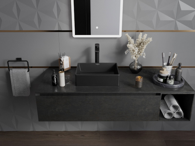 Meuble élégant sous lavabo noir dans une salle de bain