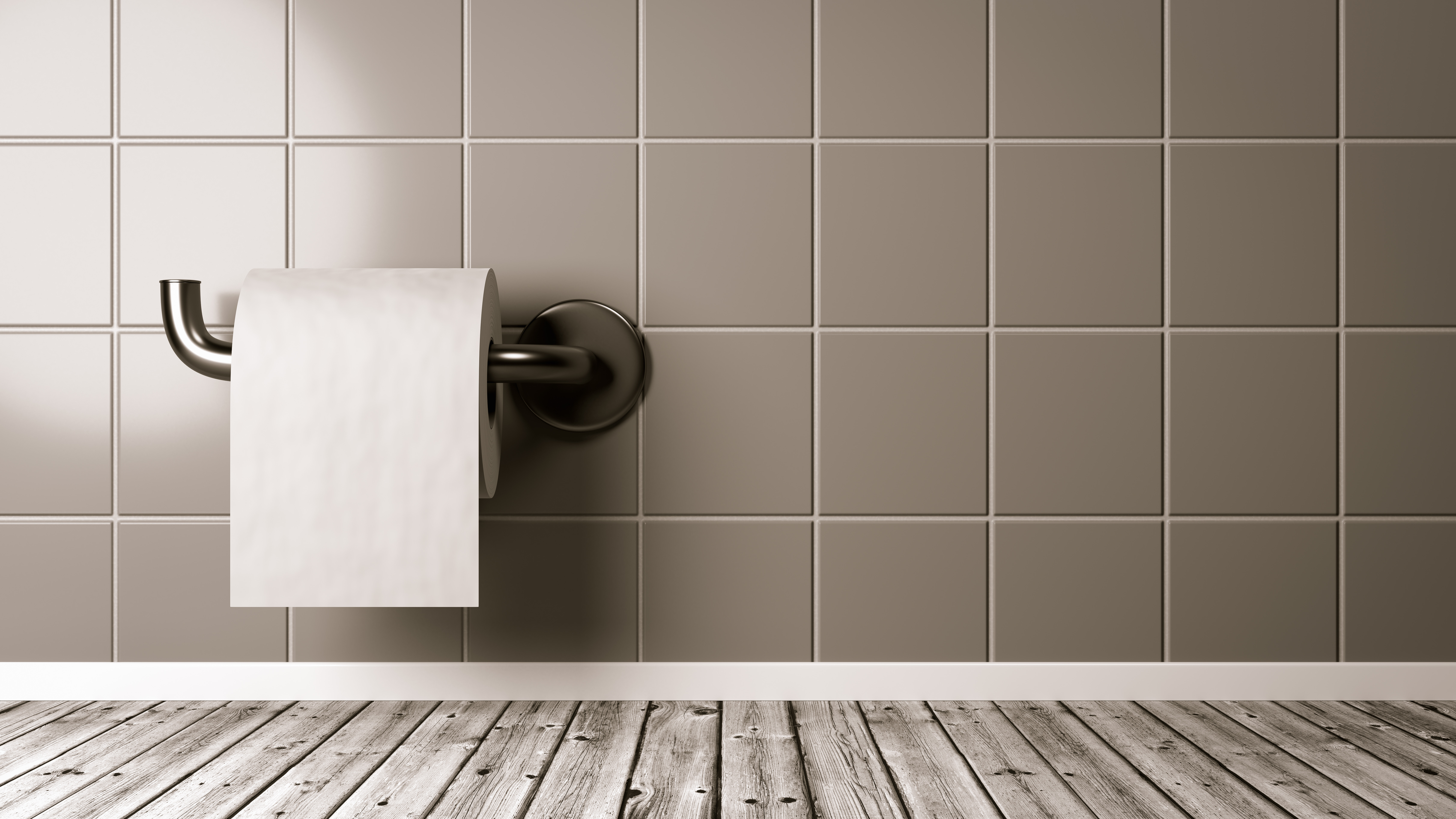 Comment coller un support pour papier toilette ?